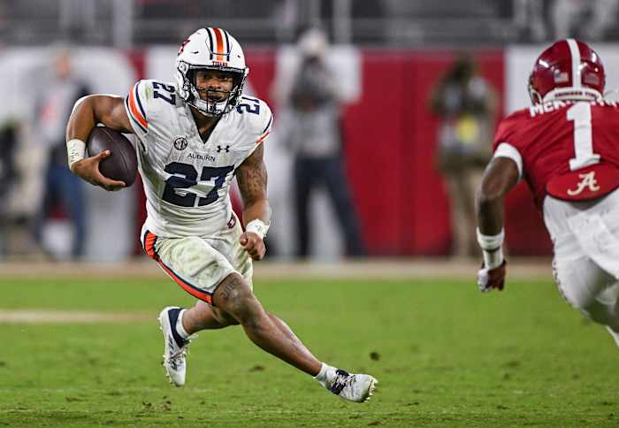 Jarquez Hunter (27) runs down the field during the game between Auburn and Alabama at Bryant-Denny Stadium. Todd Van Emst/AU Athletics